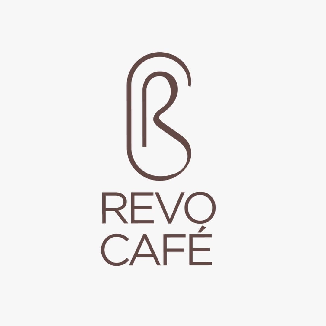 Revo Café - NH Collection Dubai the Palm logo